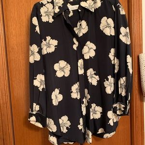 Silk black/cream blouse.  Size medium.  Shoulder width 20”.